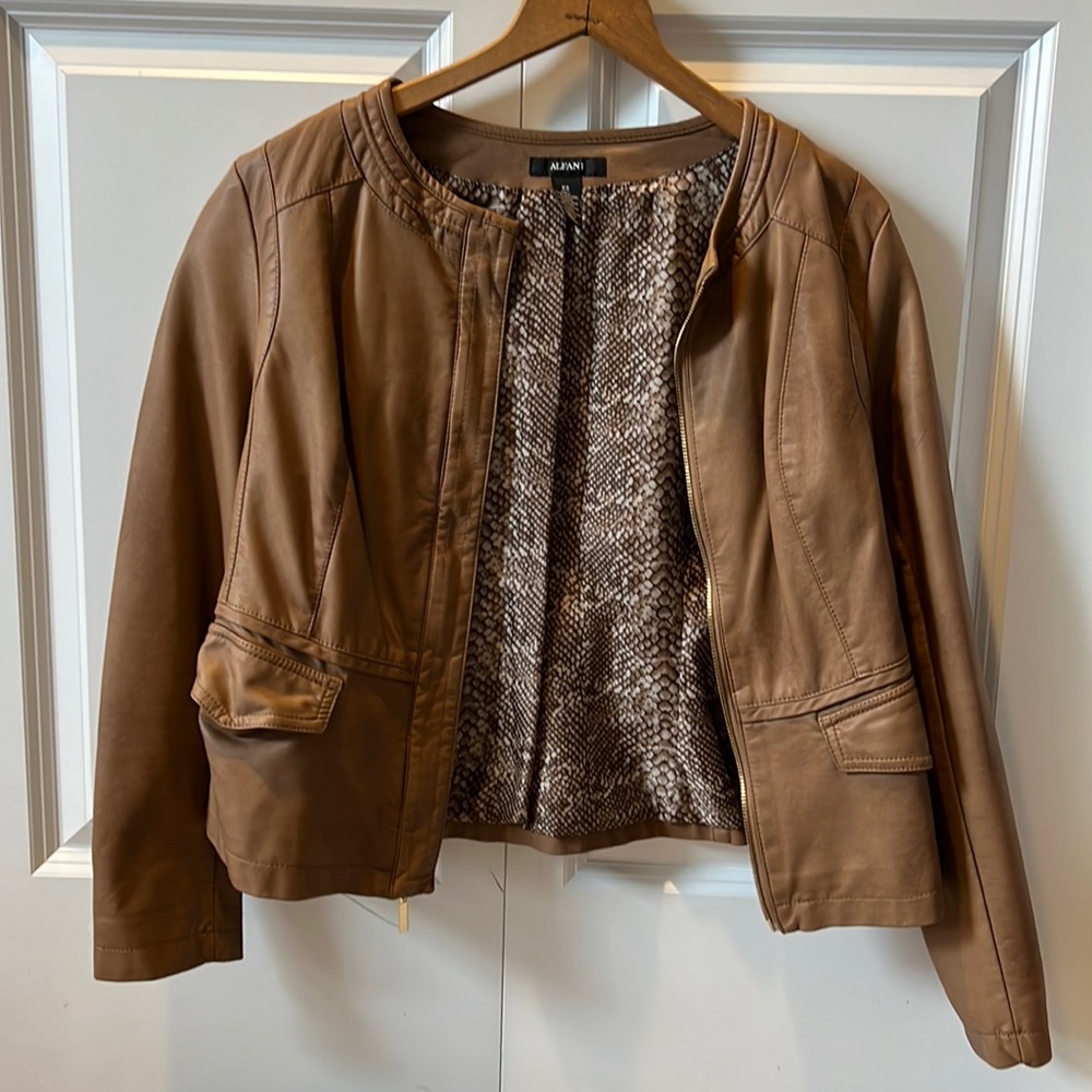 Faux leather, fully lined jacket.